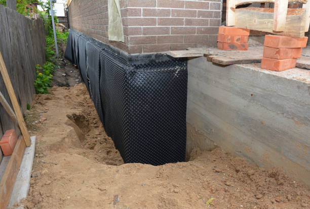 Happy homeowners after waterproofing job in Java Village
